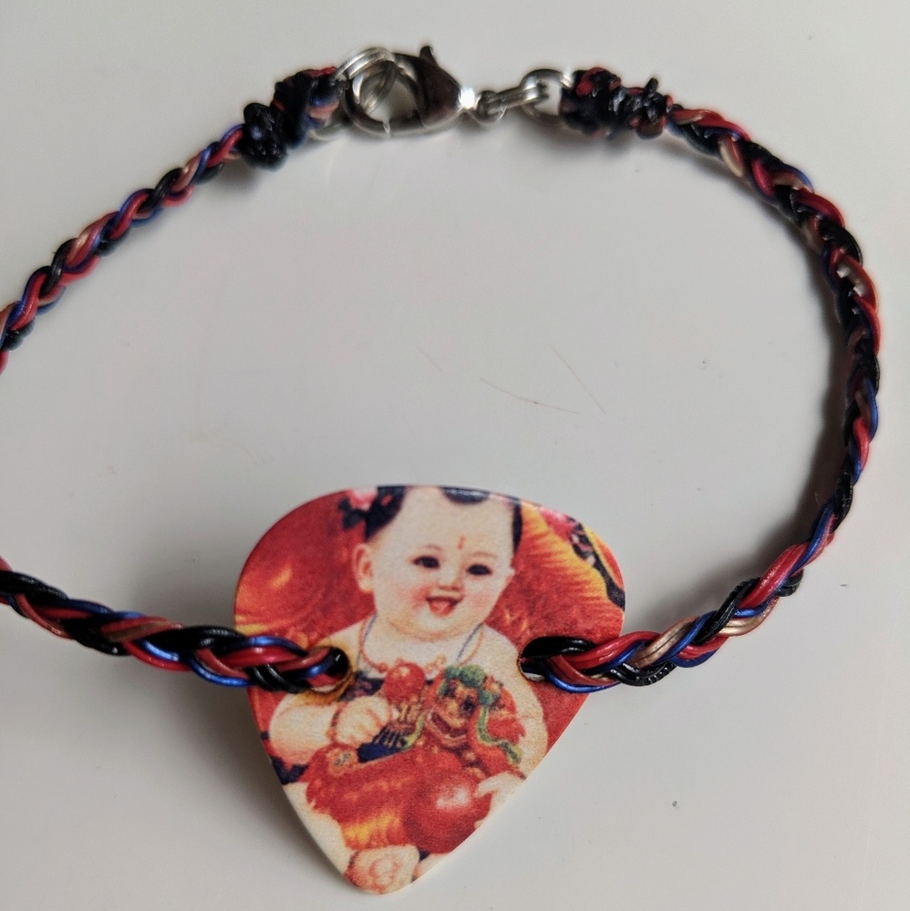 Guitar pick bracelet, asian baby girl
